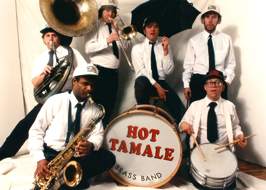 A lively brass band plays on the vibrant streets of New Orleans.